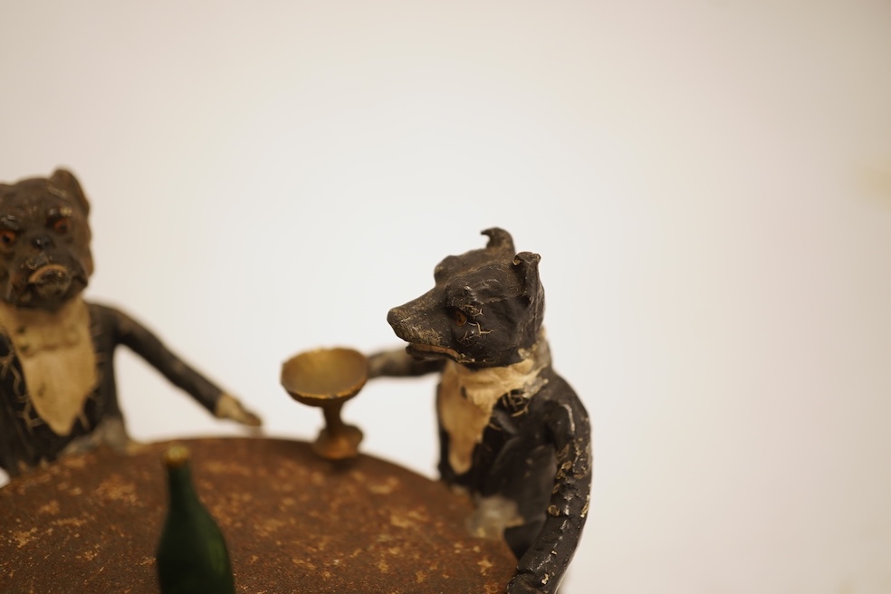 A cold painted spelter miniature ‘dog’ group, 6.5cm